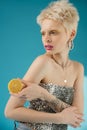 tattooed blonde albino woman with bare
