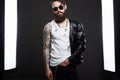 Tattooed handsome Bearded Man in sunglasses and Leather Royalty Free Stock Photo