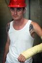 Tattooed man in plaster Royalty Free Stock Photo