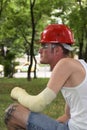 Tattooed man in plaster Royalty Free Stock Photo