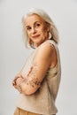 tattooed and trendy senior lady in