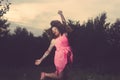 Tattooed Woman Jumping on a Forest Glade Royalty Free Stock Photo