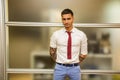 Tattooed young male office worker standing Royalty Free Stock Photo