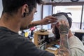 Tattooist placing the drawing on the head