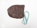 Taupe knit baby bonnet Royalty Free Stock Photo