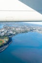 Tauranga harbour and urban peninsula aerial image with plane win