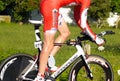 Contestants cyclists on road riding in Port of Tauranga Half-Iron-man