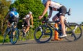 Cyclist approach turn on road in Port Of Tauranga Half-Iron-man