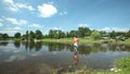 TAURIAC, FRANCE - JUNE 26: Child swimming in water on June 26, 2013 on Tauriac lake, France. Tauriac leaisure park is an open