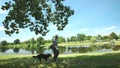 TAURIAC, FRANCE - JUNE 26: People walking their dog on June 26, 2013 on Tauriac lake, France. Tauriac leaisure park is an open pub