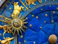 Taurus astrological sign on ancient clock. Detail of Zodiac wheel with Sun and Taurus Royalty Free Stock Photo