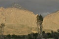 Taurus Mountains on the background of sky. Vertices covered with snow.