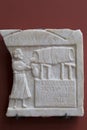 Tavern keeper tapping wine from a barrel, Roman Relief