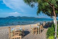 Taverna with table and chairs on Nikiana beach