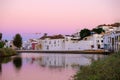 TAVIRA, ALGARVE, PORTUGAL - MAI 25, 2019: View on the old city of Tavira and the river Gilao Royalty Free Stock Photo