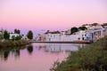 TAVIRA, ALGARVE, PORTUGAL - MAI 25, 2019: View on the old city of Tavira and the river Gilao Royalty Free Stock Photo