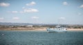 Tourist transport boats moored in the lagoons of the Ria Formosa Natural Park near the port of Tavira, portugal