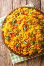 Tawa Pulao is a popular Mumbai street food of rice with vegetables and spices close-up. Vertical top view Royalty Free Stock Photo