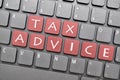Tax advice on keyboard Royalty Free Stock Photo