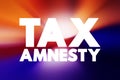 Tax Amnesty - opportunity for people who owe back taxes to pay some or all of what they owe, text concept background