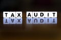 Tax Audit Spelled Out in Block Words Representing IRS Audit Stressful Taxes