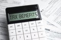 TAX benefits word on calculator. Business and tax concept. Time to pay tax in year Royalty Free Stock Photo