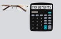 TAX benefits word on calculator. Business and tax concept. Time to pay tax in year Royalty Free Stock Photo