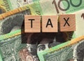 Tax and Australian hundred dollar bills