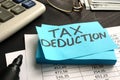 Tax deduction written on a piece of paper