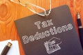 Tax Deductions is shown on the conceptual business photo