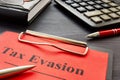 Tax evasion result of audit with clipboard. Royalty Free Stock Photo