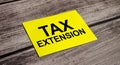 TAX EXTENSION Text on business paper on office table
