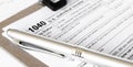 1040 Tax Form being filled out. Shallow depth of field Royalty Free Stock Photo