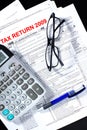 Tax form, calculator, pen Royalty Free Stock Photo