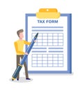 Tax Form Man Holding Big Pen Writing on Blank Royalty Free Stock Photo