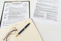 Tax Form 1040 per tax year for individual U.S. tax returns with a pen next to it. Royalty Free Stock Photo
