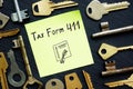 Tax Form 411 phrase on the piece of paper Royalty Free Stock Photo