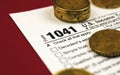 Tax form 1041, US Income tax return for estates and trusts, close up with coins Royalty Free Stock Photo