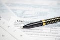 Tax forms, spread sheet with pen and calculator Royalty Free Stock Photo