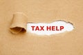 Tax help torn paper concept Royalty Free Stock Photo
