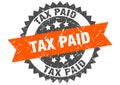 tax paid round grunge stamp. tax paid Royalty Free Stock Photo