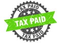 tax paid round grunge stamp. tax paid Royalty Free Stock Photo