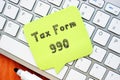 Tax 990 phrase on the sheet Royalty Free Stock Photo