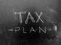 Tax Plan Handwritten on Blackboard