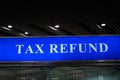 Tax refund sign board at airport