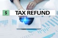 Tax refund text on virtual screen. Business and Finance concept. Royalty Free Stock Photo