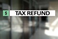 Tax refund text on virtual screen. Business and Finance concept. Royalty Free Stock Photo