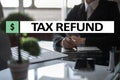 Tax refund text on virtual screen. Business and Finance concept. Royalty Free Stock Photo