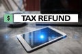 Tax refund text on virtual screen. Business and Finance concept. Royalty Free Stock Photo