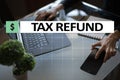 Tax refund text on virtual screen. Business and Finance concept. Royalty Free Stock Photo